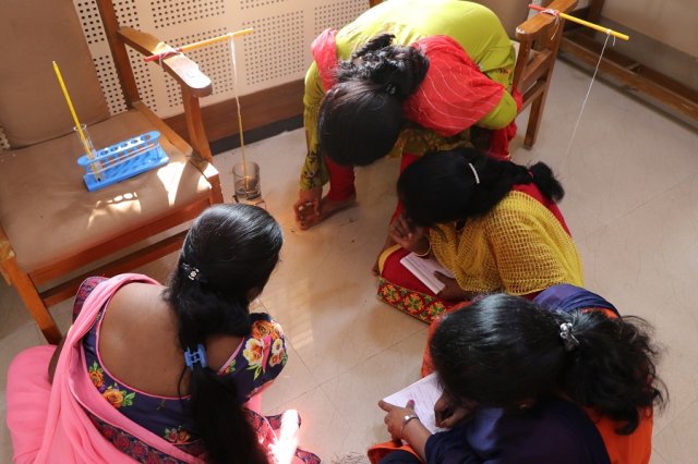 Noting the temperature of hot water.