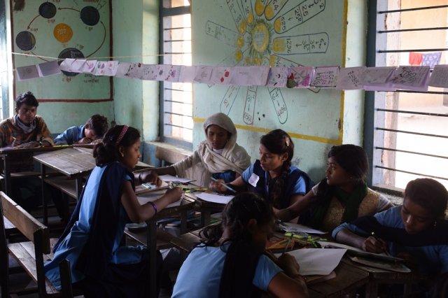 Making their own little magazine.